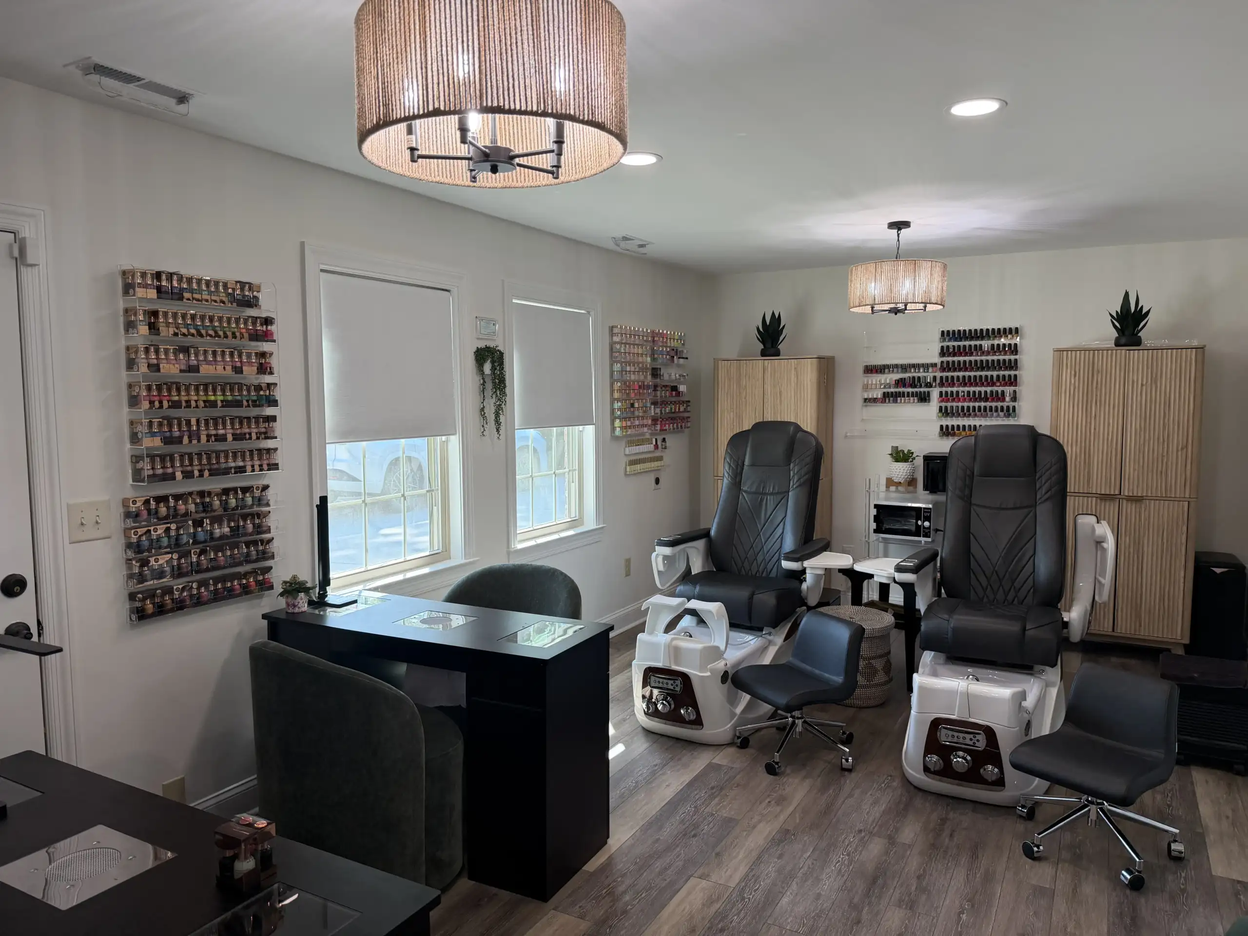 Image of nail tech stations at Lusso Hair Studio & Spa located in Winston-Salem, NC.