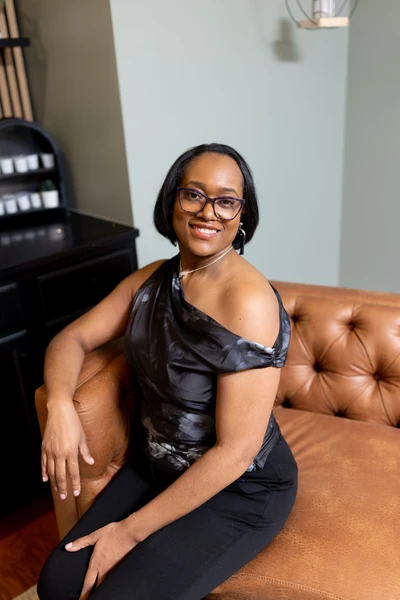 Massage therapist, Ebony Smith, at Lusso Hair Studio & Spa located in Winston-Salem, NC